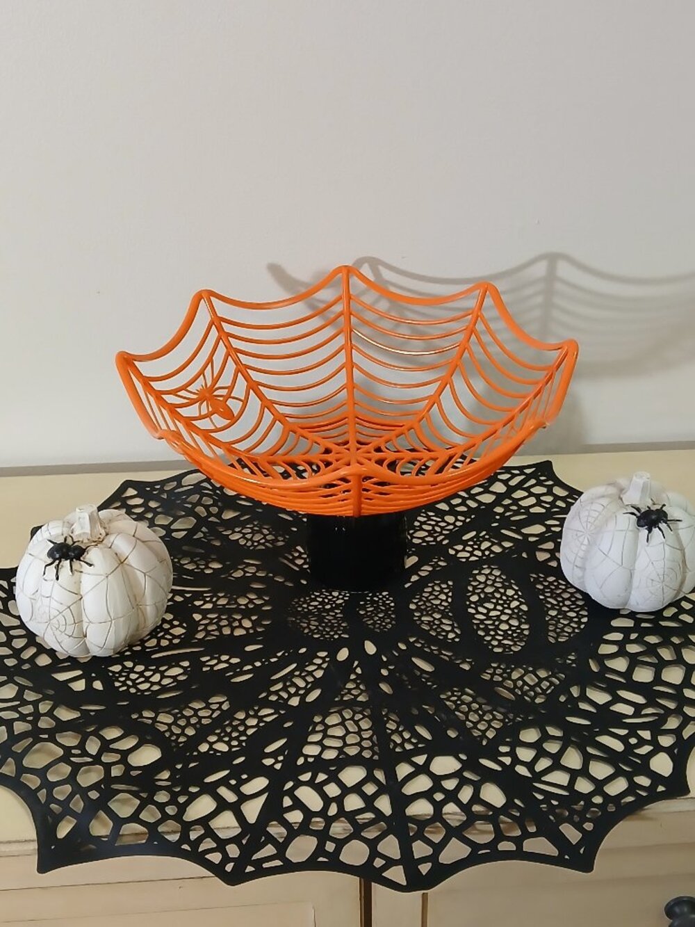 Halloween spider web bowl on stand with 2 spider pumpins and spider web placemat